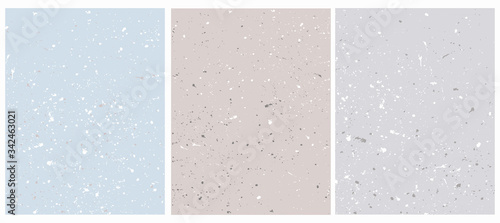 Abstract Vector Layouts with Freehand Brush Stains. White Splashes on a Light Blue, Gray and Pale Brown Backgrounds. Geometric Backdrop. Pastel Color Vector Blanks with no Text.