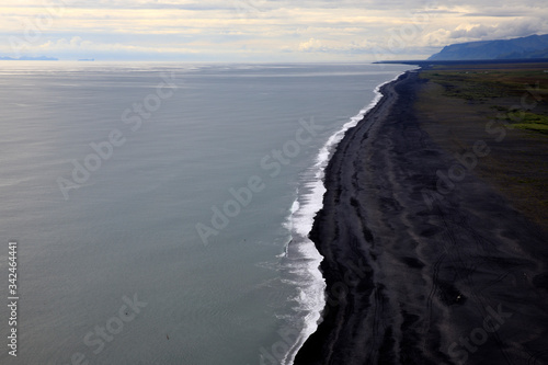 Vik / Iceland - August 15, 2017: The volcanic beach view from Dyrholaey promontory, Vik, Iceland, Europe