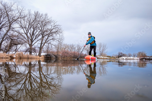 solo lake paddling as social distancing recreation