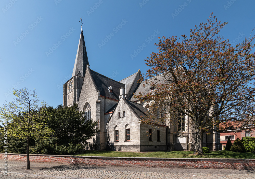 Side view of the gothic parish church in the city centre of Heist-op-den-Berg, Belgium
