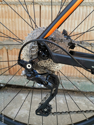 Close up of the derailleur of a vintage seventies black racing bicycle