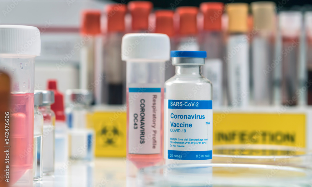 Coronavirus covid-19 experimental vaccine in a laboratory, conceptual image Coronavirus covid-19 experimental vaccine in a laboratory, conceptual image