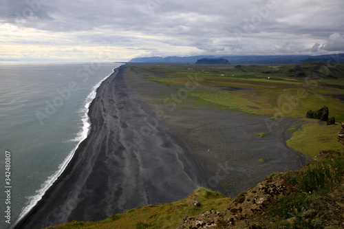 Vik / Iceland - August 15, 2017: The volcanic beach view from Dyrholaey promontory, Vik, Iceland, Europe