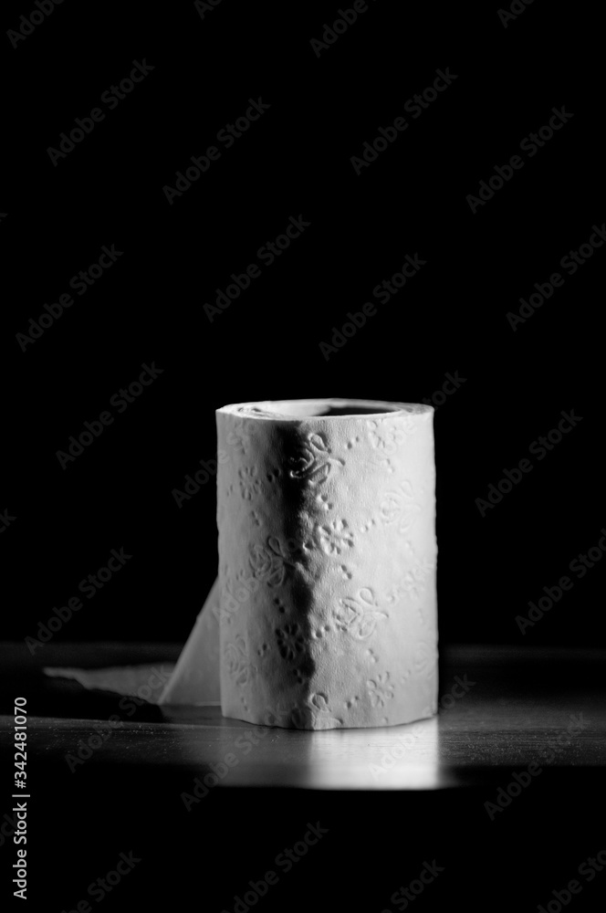 toilet paper roll on black background Stock Photo | Adobe Stock