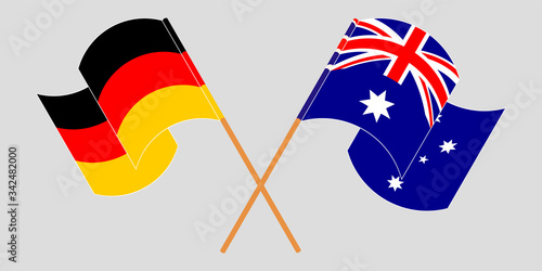 Crossed and waving flags of Australia and Germany