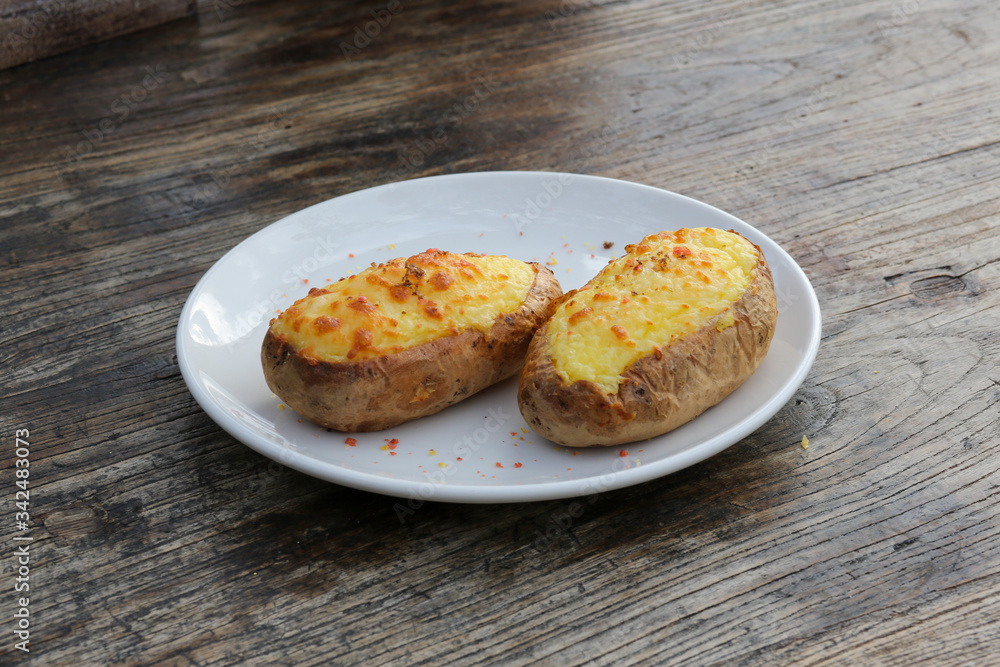 baked potato on a white plate
baked potato on a white plate