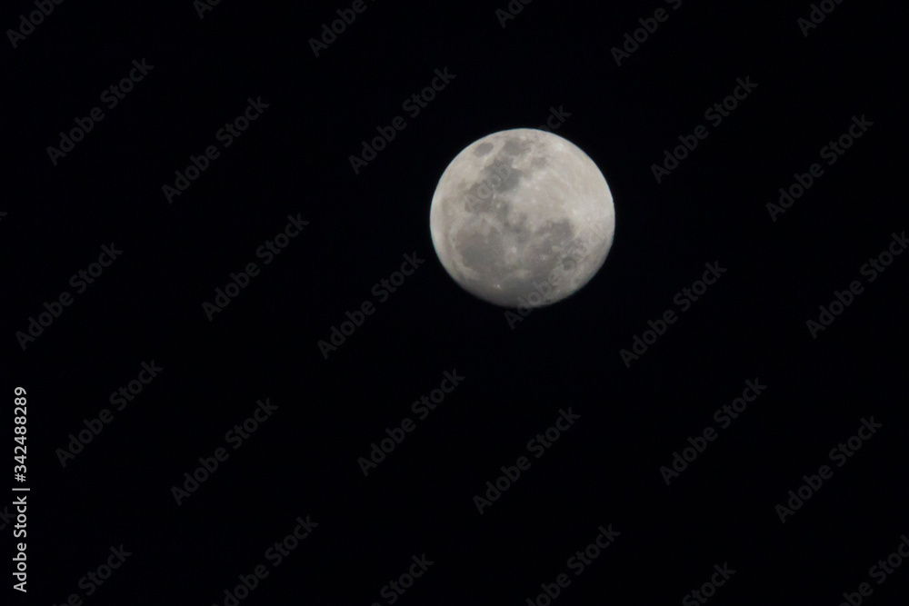 Very detailed moon in the sky on black background Very detailed moon in the sky on black background