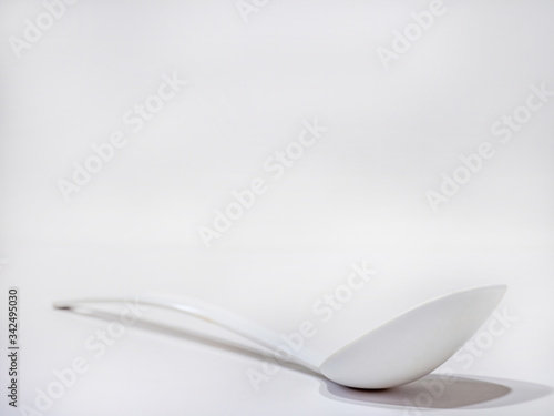 white serving spoon on white