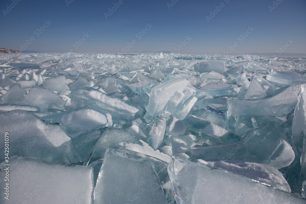 Beautiful clear ice of Lake Baikal on a sunny day