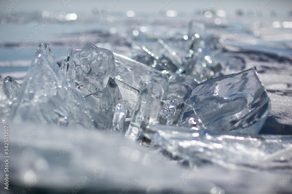 Beautiful clear ice of Lake Baikal on a sunny day Beautiful clear ice of Lake Baikal on a sunny day
