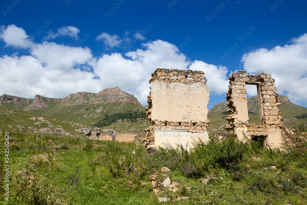 Abandoned village overlooking Mount Elbrus. Old house and amazing nature Abandoned village overlooking Mount Elbrus. Old house and amazing nature