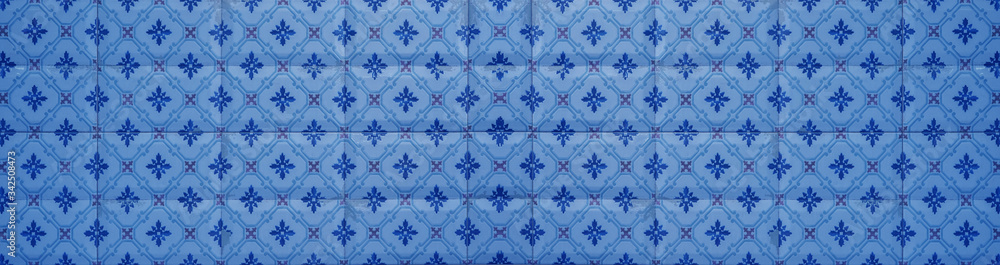Blue vintage retro geometric square mosaic motif cement tiles flower blossom print texture background banner panorama