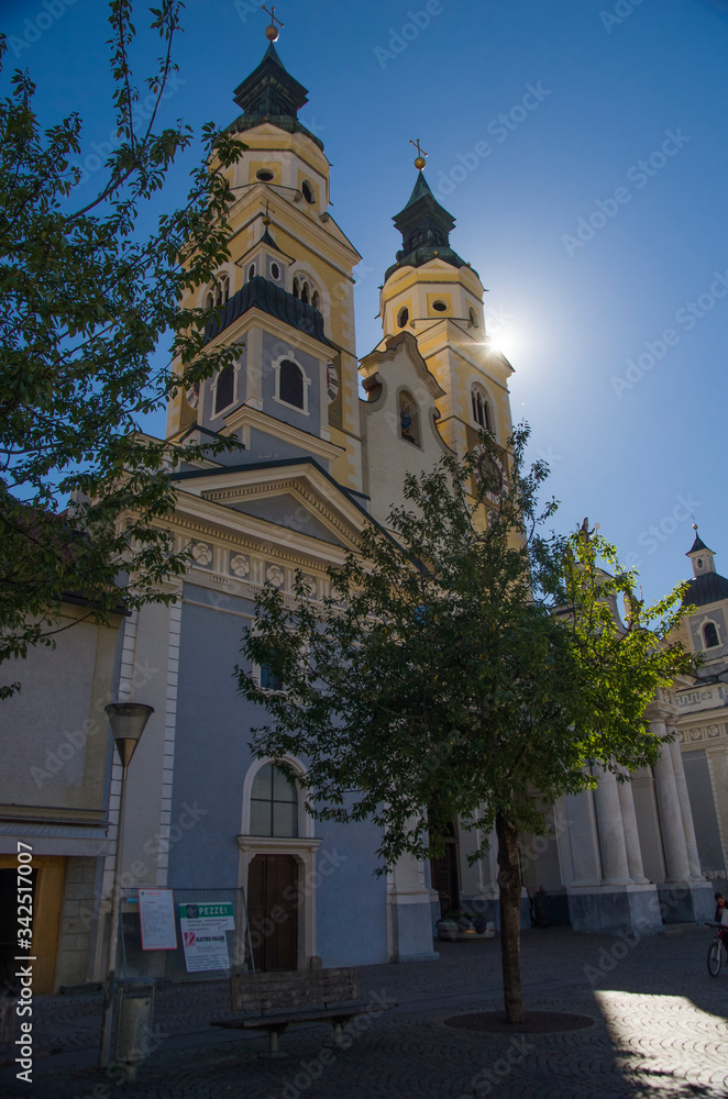 Cathedral of Bressanone, Brixen, in the morning light and in the blue sky.