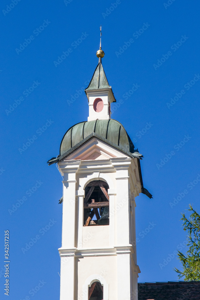 European style mountain church under blue sky European style mountain church under blue sky