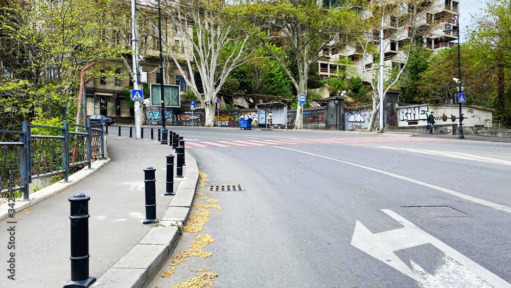 Naklejka premium TBILISI, GEORGIA - APRIL 21, 2020: Empty Tbilisi, Street is normally gridlocked with shoppers and traffic.