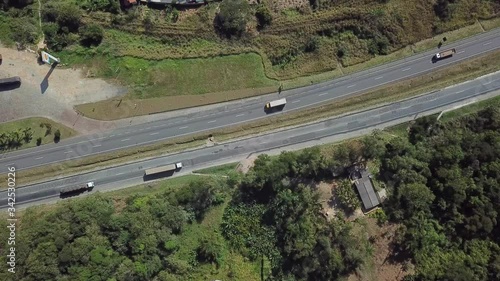 Drone aerial shot from a highway  in Sao Paulo showing cars, trucks and traffic photo
