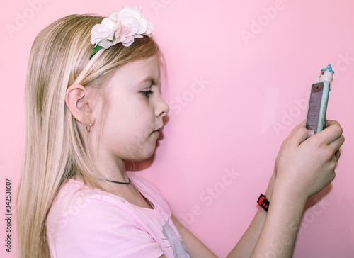 Online call parents or friends. Beautiful girl talking via video calling on a tablet. Distance learning online education lifestyle concept. Communication, distance learning, talking with family