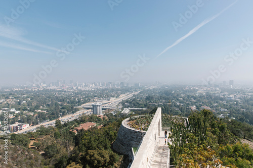 Los Angeles view of the highway from a mountain at sunset, clear blue skies (ID: 342532653)