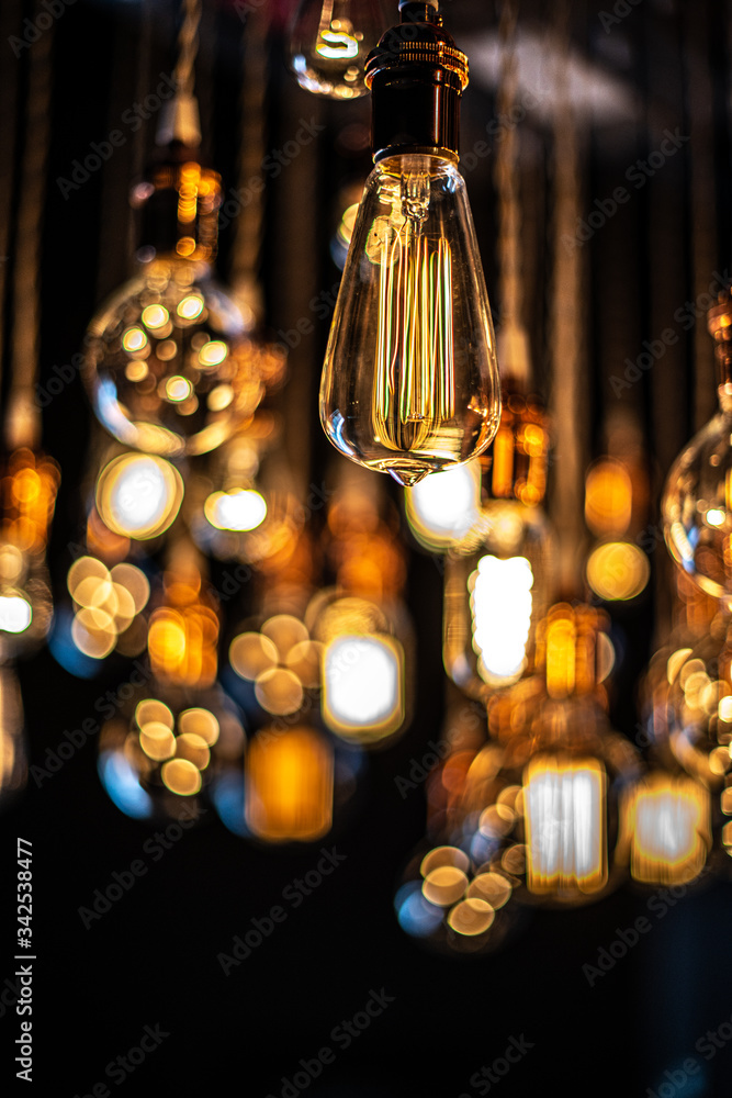 Hanging array of many incandescent light bulbs Hanging array of many incandescent light bulbs