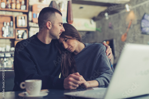 Young couple hugging and they are sad