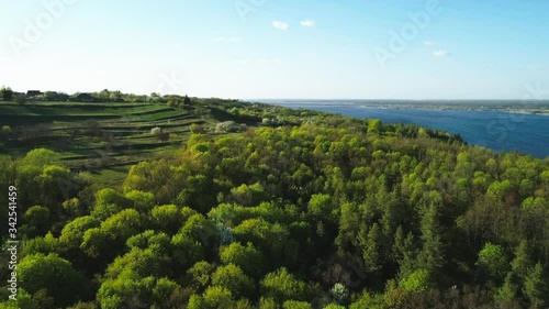 Aerial view flying over Vitachiv village hills near Dnipro river at sunset. Horodyshche Novgorod-Svyatopolche photo