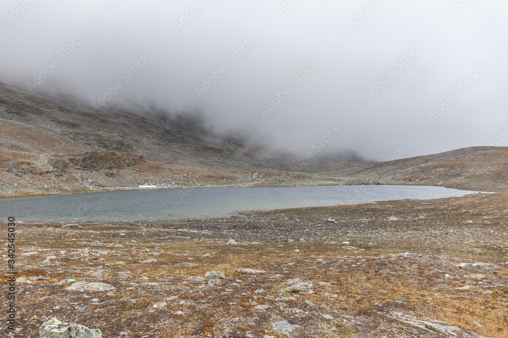 Blue lake in the Arctic mountains of a Sarek National Park. Blue lake in the Arctic mountains of a Sarek National Park.