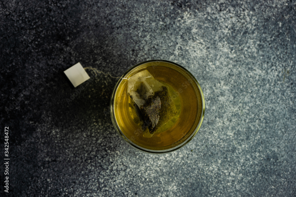 Glass of green tea in glass cup Glass of green tea in glass cup