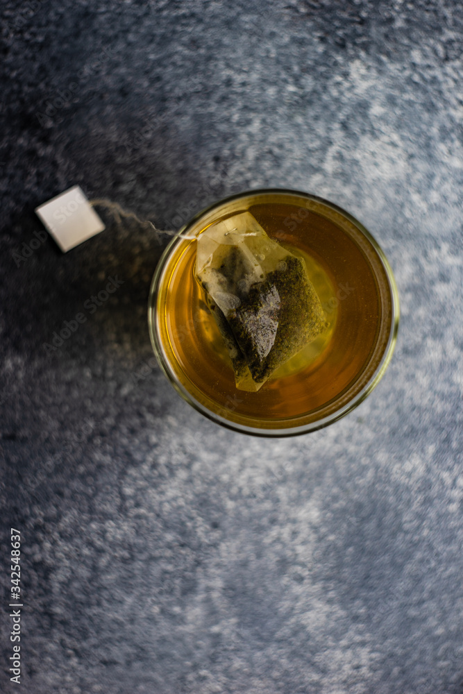 Glass of green tea in glass cup Glass of green tea in glass cup