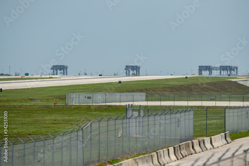 Empty runways at Fort Lauderdale International Airport at travel slows due to Coronavirus Covid 19 pandemic © Felix Mizioznikov