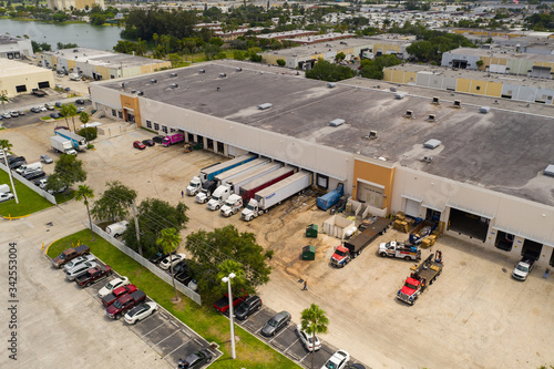 Fototapeta Pembroke Park FL food distribution warehouses with reefer trucks