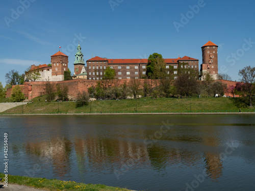 The former Royal residence of Polish monarchy, Wawel Castle, Krakow, Poland. Spring time, view from the Vistula river boulevard.