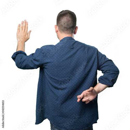 Young man wearing a blue outfit. Cheating.