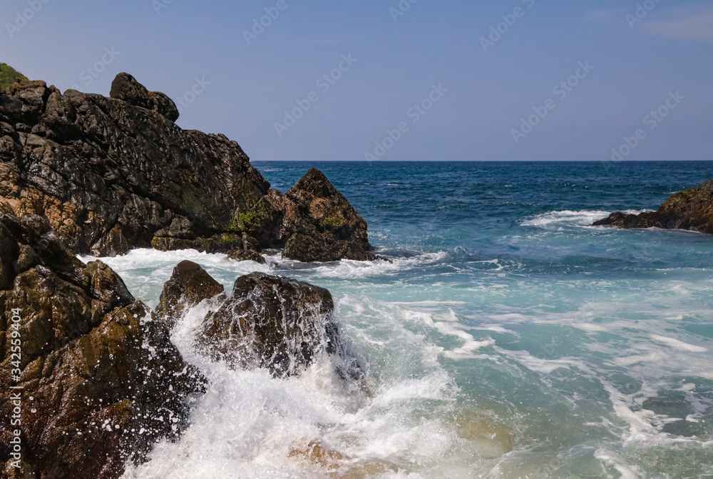 Waves Crashing on the Rocks In Playa Mayto