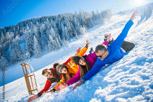 Friends Have Fun At Winter On Fresh Snow