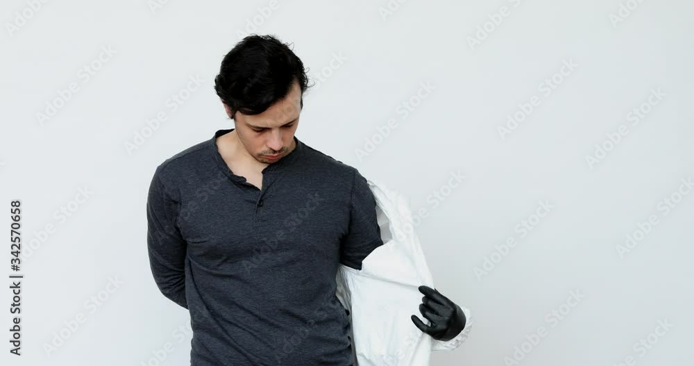 putting on and wearing PPE masks during covid19 virus pandemic