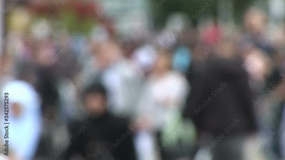 Defocused view of crowd of people shopping in Manchester city Defocused view of crowd of people shopping in Manchester city