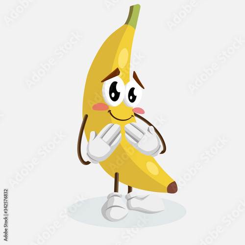 Banana Logo mascot ashamed pose and background with flat design style for your logo or mascot branding.