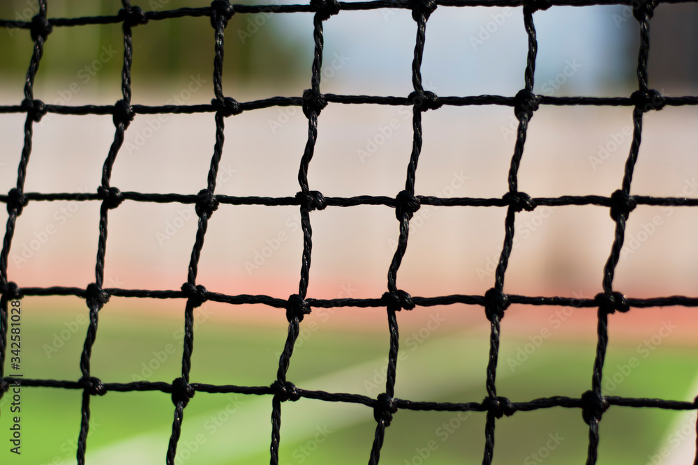 Fototapeta premium Tennis nets in the daytime.
