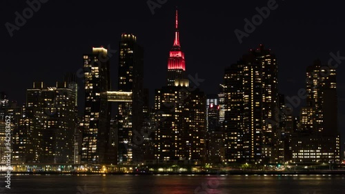 Night time Lapse of midtown manhattan with  Heartbeat light on empire state building