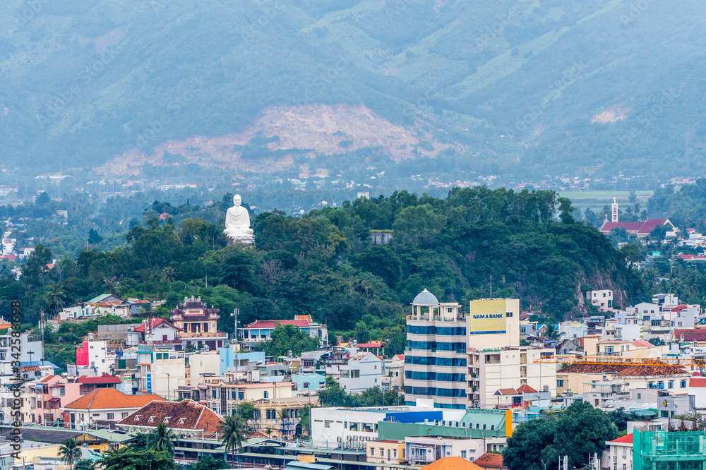 Beautiful view on Nha Trang and Nha Trang Bay of the South China Sea on blue sky background in Khanh Hoa province in Vietnam.