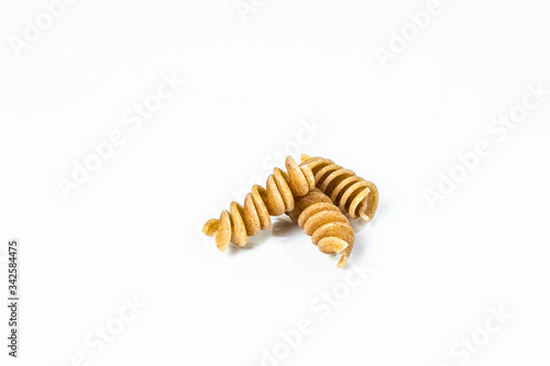 not cooked pasta close-up on a white background