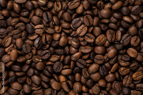 loose coffee grains photographed closeup