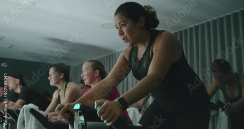 Group of people taking spin class