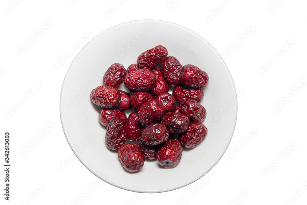 A bowl of red jujube. A kind of herb supplement to improve immune ability. A bowl of red jujube. A kind of herb supplement to improve immune ability.