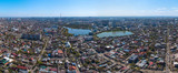 aerial drone view - old historic center of Krasnodar city (South of Russia) on a sunny day in April - Gorky street and Karasun lakes