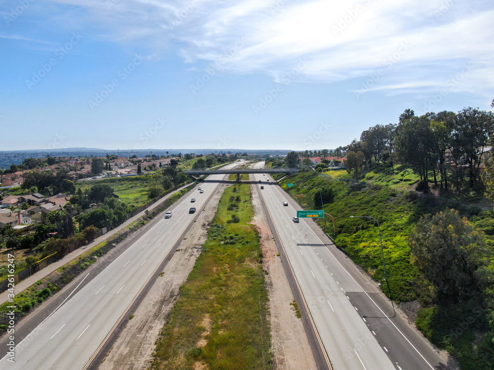 Aerial view of highway, freeway road with vehicle in movement. California, USA.