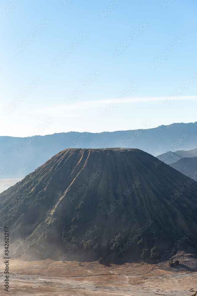 Mount Batok the volcano next to mount Bromo at the Tengger Semeru National Park in East Java, Indonesia.