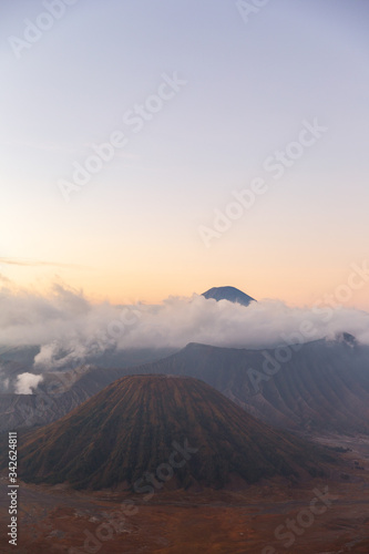 On the right side of the Bromo volcano is the Batok volcano. It is a beautiful view of Indonesia. The farthest away is the Semeru volcano.