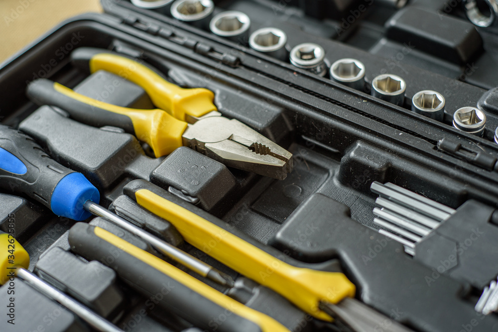 Fototapeta premium a tool kit in a suitcase to repair something.