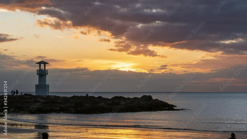 Famous Khao Lak beach with light beacon or lighthouse for navigation, Phang-Nga, Thailand; day to night - Time Lapse Famous Khao Lak beach with light beacon or lighthouse for navigation, Phang-Nga, Thailand; day to night - Time Lapse